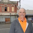 Living Well Mataura Church pastor Mike Whale stands in front of the Galt building and the...