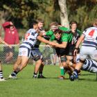 Eastern Northern Barbarians flanker Leroy Ferguson has lock Woody Kirkwood giving him a helping...