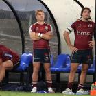 Queensland Reds players Fraser McReight (right) and Tate McDermott look on after being sent from...