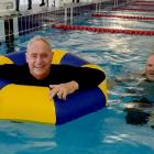 Mayor Phil Mauger and Hornby Ward councillor Mark Peters jumped in to the main pool fully clothed...