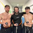 Ice Blacks (from left) Jacob Carey, Colin McIntosh and Jackson Fontaine celebrate their first...