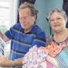 Marianne and John Whyte look over some of the many emails they have received from grateful...