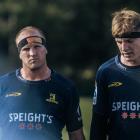 Mitch Dunshea (left) will make his Highlanders debut alongside young lock Fabian Holland against...
