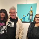 Oamaru-based artist Martin Horspool stands by his artwork with Wendy (left) and Judith Jones at...
