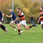 Zingari's Shaun Driver inflicting damage on the Dunedin Sharks at Montecillo last Saturday. PHOTO...