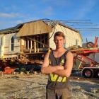 King House Removals labourer Jake Willis is part of the team that has loaded the former Lumsden...