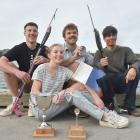 Displaying the silverware up for grabs at the Otago Student Spearfishing and Hunting Club...