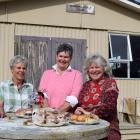 Serving food in Dunback are (from left) Waihemo Collie Club cookhouse manager Linda Smith, bar...