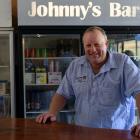Warepa Collie Club vice-president and barman Johnny Bennett, of Te Houka, has been serving dog...