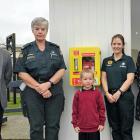 Showing off the newly installed AED at Gleniti School are (from left) Gleniti and North Timaru...