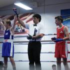 William Crooks has his hand raised by referee Jarrod Ngatai after a first-round stoppage victory...