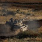 An Israeli tank manoeuvres near the Israel-Gaza border earlier this week. Photo: Reuters