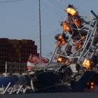 Explosives are detonated to free the container ship Dali after it was trapped following its crash...