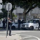 Security forces guard the French High Commissioner's office as French President Emmanuel Macron...