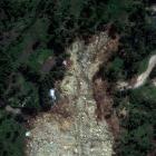 A satellite image shows buried homes after the landslide in Yambali village. Photo: Maxar...