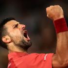 Defending champion Novak Djokovic celebrates getting through to round two at Roland Garros. Photo...