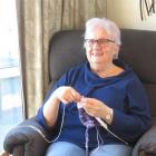 Judy Swaney knitting Humpty Dumpty toys at home for charity. Photo: Supplied