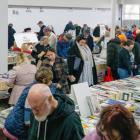 Customers rush into Oamaru's Bookarama yesterday in the former Noel Lemming building to grab the...