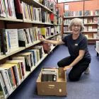 Alexandra library assistant Christine Gourley begins preparations for the move to a space in...