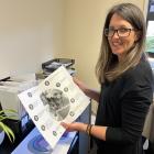 Alexandra-based Alzheimer’s Otago community educator Lynne Symons holds some of the material she...
