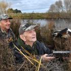 Searching the sky on the opening day of duck-shooting season, on Bungards farm south of Mataura...