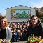 Laura Downing, left, and Natasha McColl spent many hours working on a mural at Gore Main School....