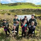 Holding some of the ducks shot on a northern Southland pond on opening weekend are (back from...