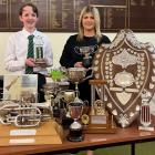 The Ascot Park Hotel Brass Band and the Ascot Park Hotel Auxiliary Brass Band both won their...