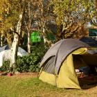 Homeless people living in tents at the edge of the Oval in Dunedin were visited by housing...