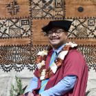 University of Otago graduand Jekope Maiono celebrates the completion of his PhD at the Pacific...