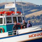 Outgoing owner of Monarch Wildlife Cruises and Tours Neil Harraway (centre) with new owners Ike ...