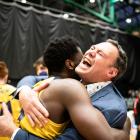 Otago Nuggets coach Brent Matehaere celebrates with shooting guard Keith Williams after the...
