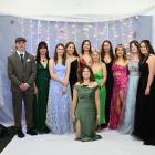 Enjoying the school formal are (from left, back row) 17-year olds William Clare, Maia Perry,...