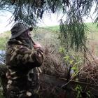 Bleating out a call for ducks in the Mokotua area is Invercargill man Phil Peek.