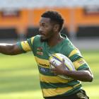 Green Island wing Vilimone Bainibure looks to fend Alhambra Union flanker Tyron Pelasio during...