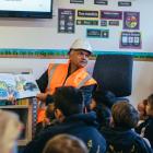 Roading project The Alliance communications manager Alan Howard-Smith reads to pupils at...