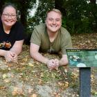 Inspecting a new native bee information panel at Robin Hood Park are Entomological Society of New...