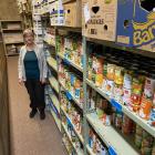 Presbyterian Support Otago Family Works foodbank co-ordinator Marilyn Donaldson stands amid the...