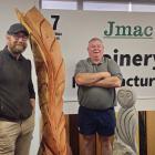 Sculptor Steve Molloy (left) and Jmac Joinery owner John McCarthy show off sculptures that will...