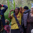 Women grieving at Yambali village in Papua New Guinea's Enga Province, where about 2000 people...