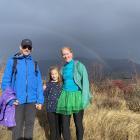 Louise Clark joined on her hike by husband Ian and daughter Emila, 7, along with a rainbow. PHOTO...