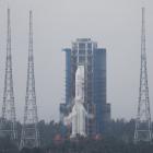 The Chang'e 6 lunar probe and the Long March-5 Y8 carrier rocket combination sit atop the launch...