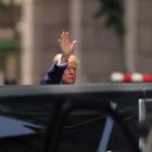 Donald Trump gestures to people outside Trump Tower in New York the day after being found guilty...