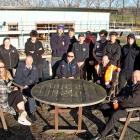 Big River Trades academy take a celebratory smoko pie-shout with (seated, from left) Kaelyn...