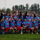 The triumphant Southern Region premier rugby team celebrate their win over Central Otago in the...