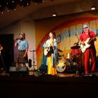 Australian country music singer Fanny Lumsden is accompanied on stage in Kurow by her band The...