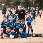 Queenstown’s champion under-9 football team — back row, from left, Harry Davis, Fletcher Smith,...