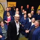 Cargill Enterprises chief executive Geoff Kemp congratulates Deborah Riley and other graduates at...