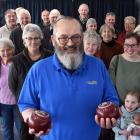 Bowls Dunedin manager Darryl Young celebrates his retirement after 20 years at a special function...