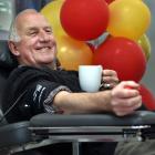 David Bond prepares to give his 304th donation of blood — not shaken or stirred — as part of...